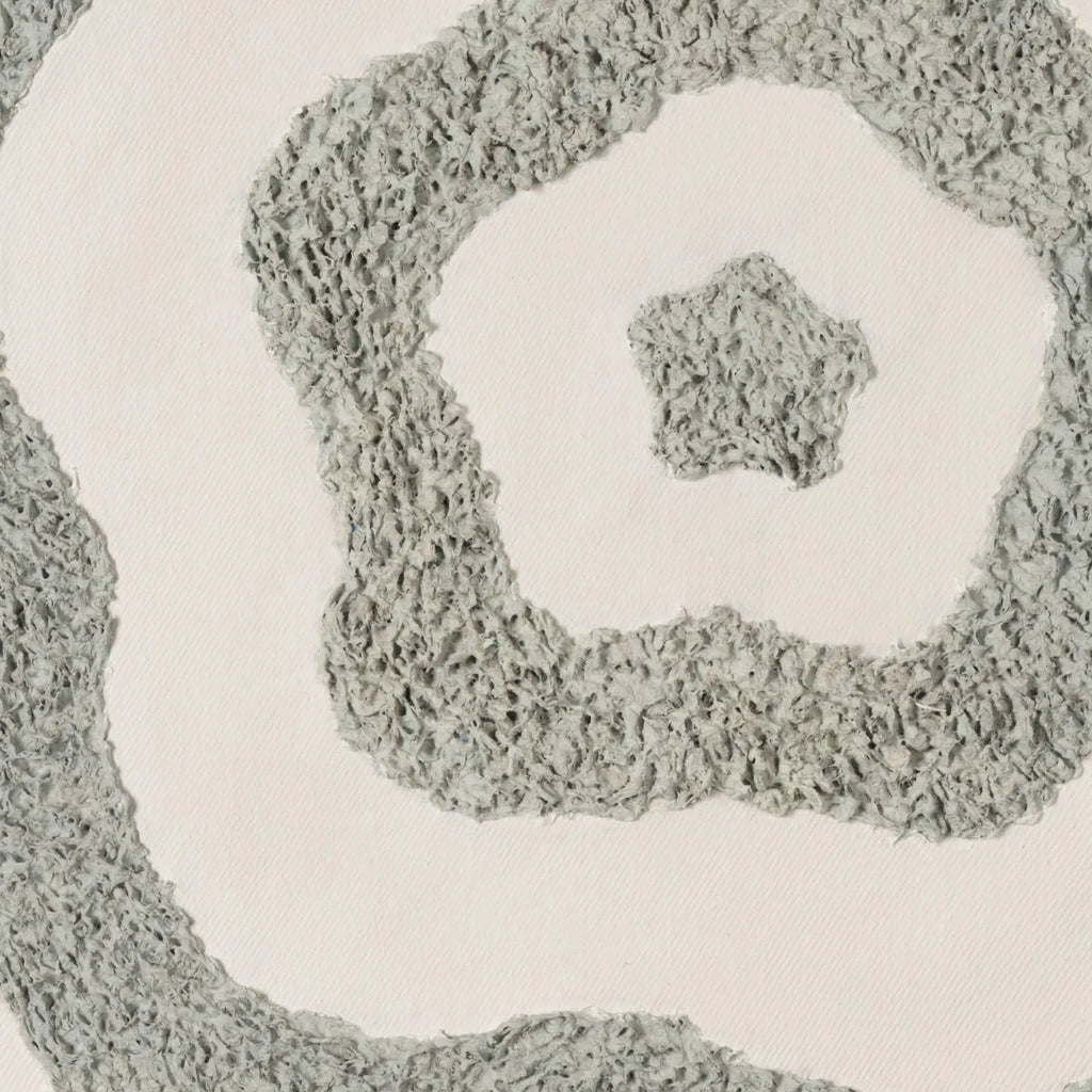 Close-up detail of raised textured abstract canvas surface in soft sage-grey