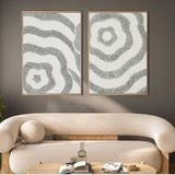 Neutral textured abstract canvas set of 2 styled above a curved sofa