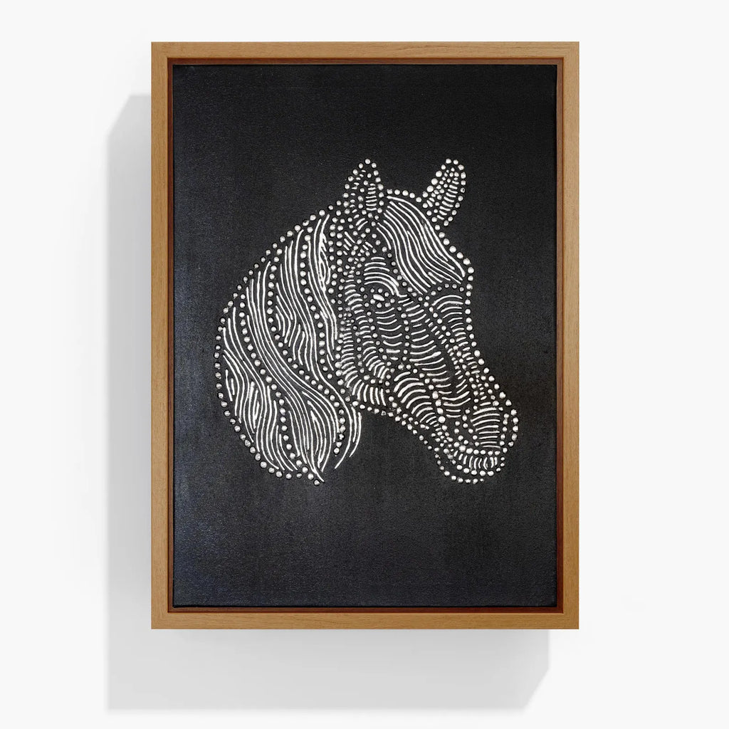 Textured horse wall art in a natural wood frame on a black canvas background