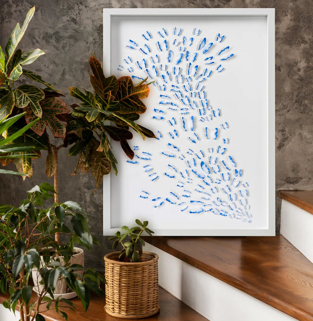 Blue Butterfly Wall Art styled near indoor plants and wooden stairs in a modern home