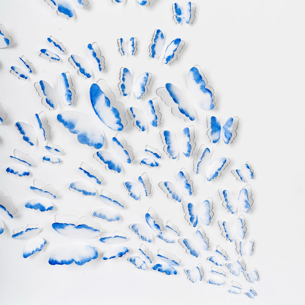 Detailed close-up of the lower section of Blue Butterfly Wall Art with layered butterfly forms