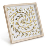 Angled view of Gold Butterfly Spiral Wall Art showing the layered 3D paper butterfly composition
