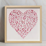 Pink Butterfly Heart Wall Art styled in front of a soft marble background