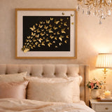 Front view of gold butterfly wall art in a frame on dark background